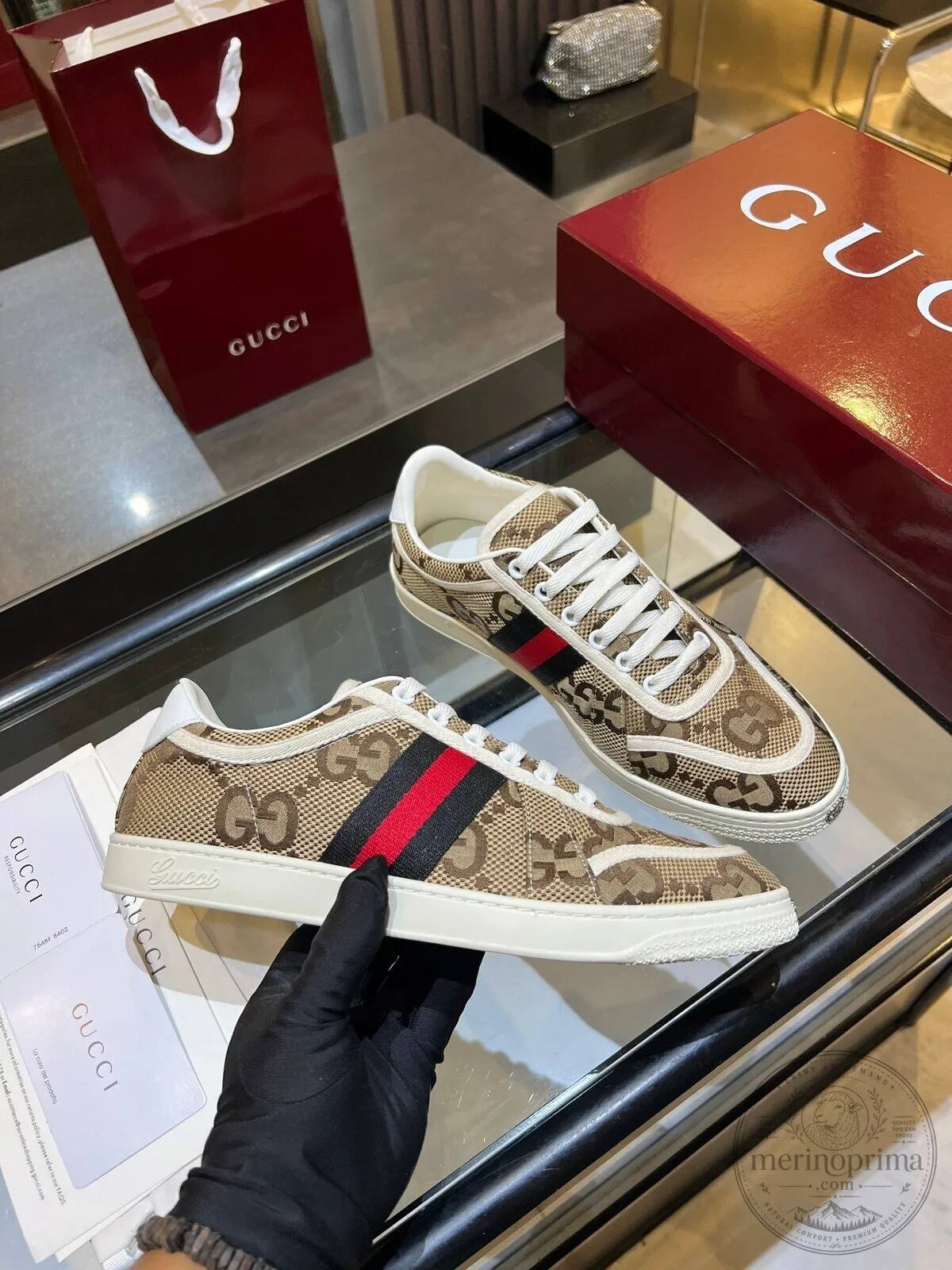 Gucci Low-Top Sneakers in GG Supreme Canvas Featuring Web Stripe Accents